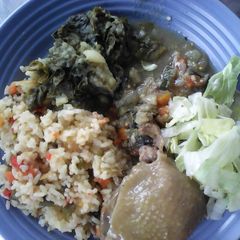 A picture of Vegetable rice with spinach.