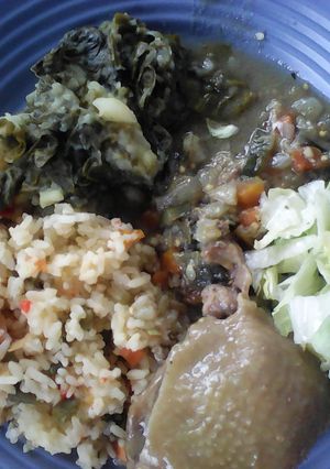 A picture of Vegetable rice with spinach.