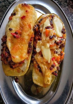 Una foto de Zucchini Relleno de Lentejas