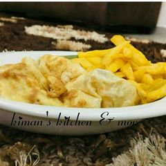 A picture of Fried egg with chips.