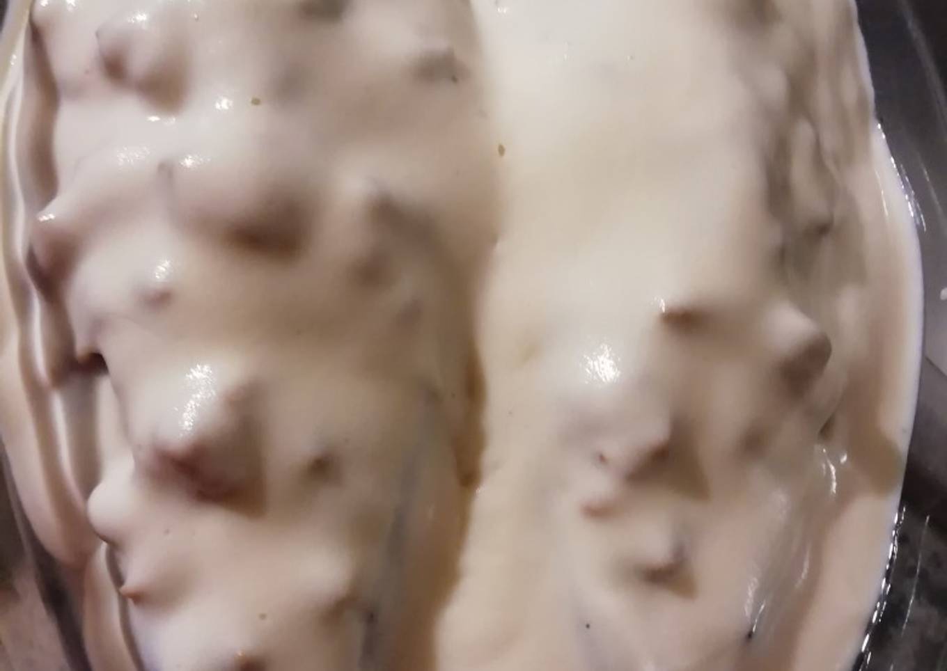 Berenjenas rellenas de carne picada bañadas en bechamel