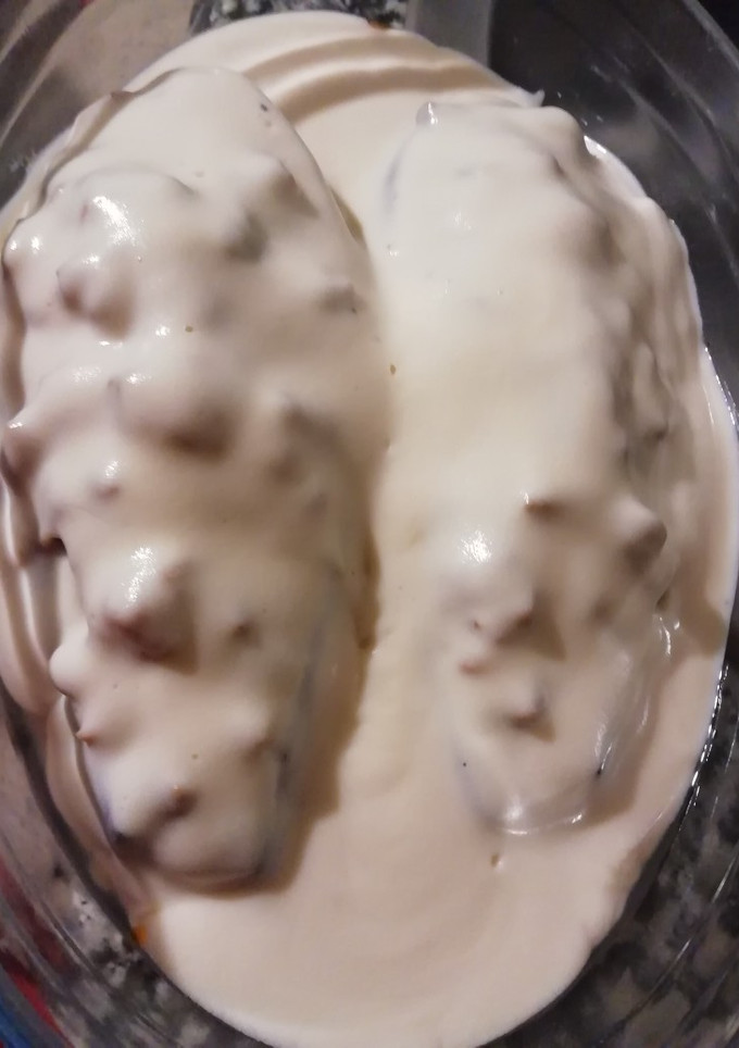 Una foto de Berenjenas rellenas de carne picada bañadas en bechamel