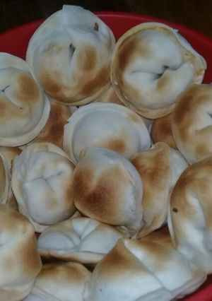 Una foto de Empanadas de salchicha con queso