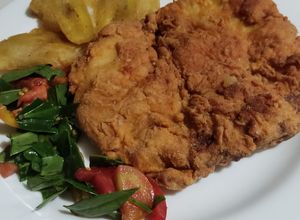 Una foto de Pechuga de pollo Broaster