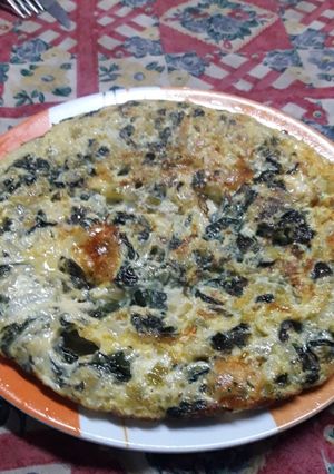 Una foto de Tortilla de espinaca, cebolla y zapallito