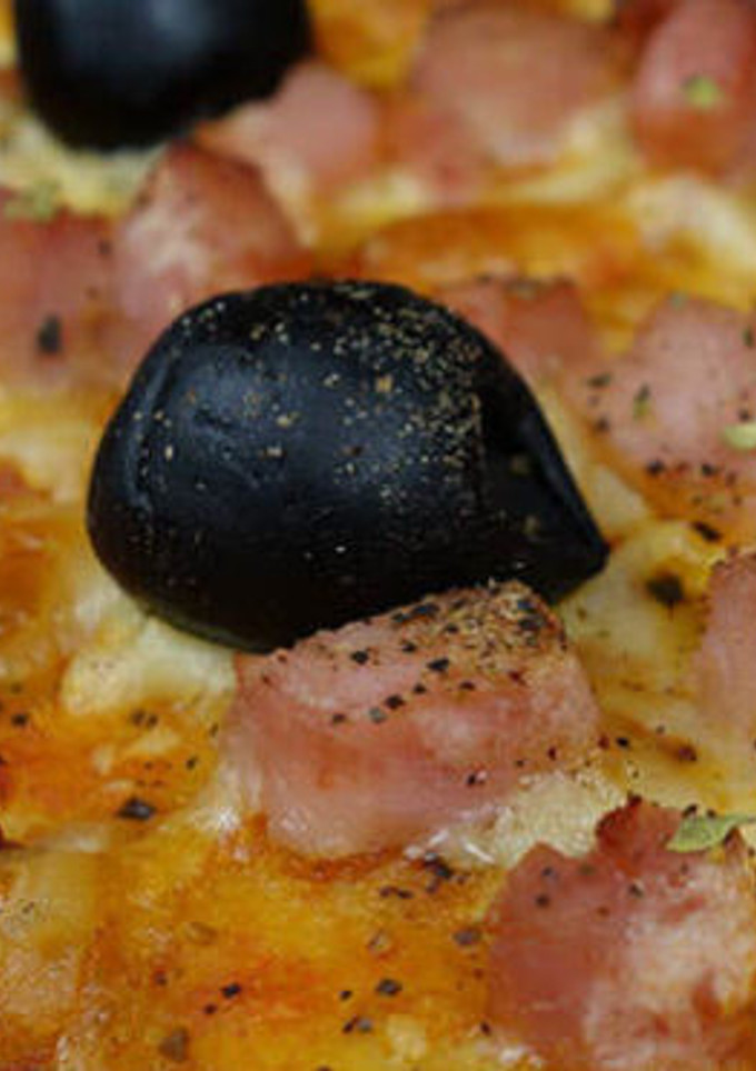 Una foto de Pizza con masa de harina de quinoa