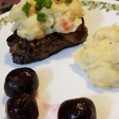 A picture of Strip Steak & Crabmeat Mashed Potatoes with Beets.