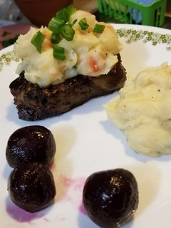 A picture of Strip Steak & Crabmeat Mashed Potatoes with Beets.