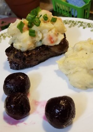 A picture of Strip Steak & Crabmeat Mashed Potatoes with Beets.