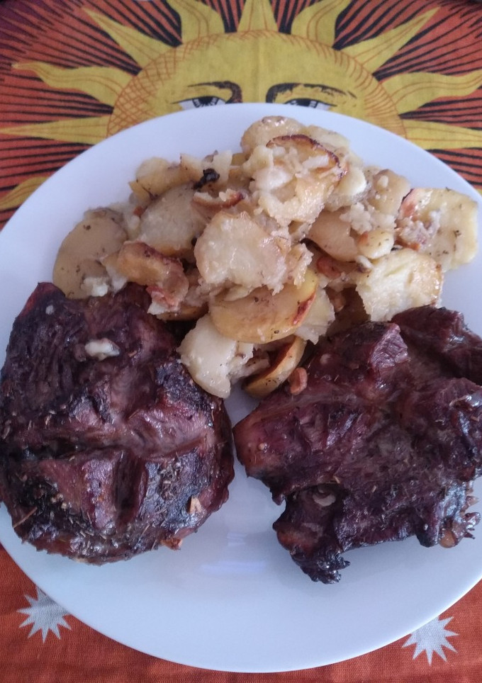 Una foto de Galtas al horno con patatas