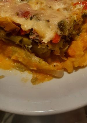 Una foto de Brócolis al horno con batata y queso
