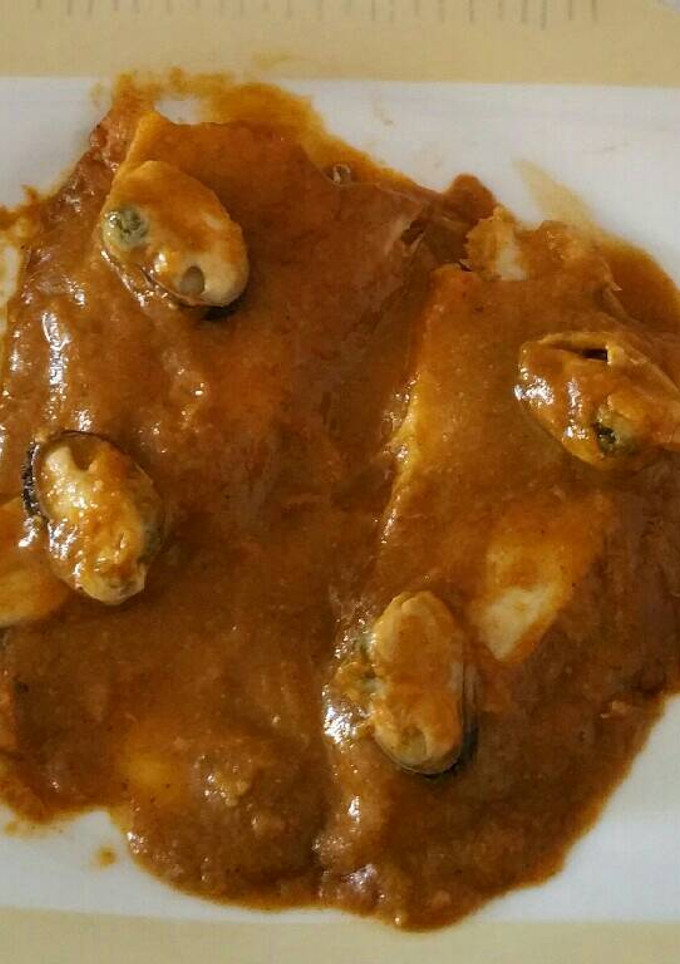 Una foto de Gallos con salsa de mejillones