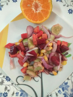 A picture of Corn beetroot cucumber salad.