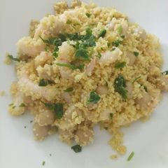 A picture of Cous cous salad with prawns and chickpeas.