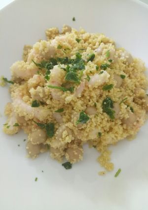 A picture of Cous cous salad with prawns and chickpeas.