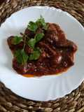 Higaditos de pollo en cebolla y salsa de tomate