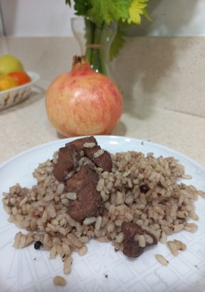 Una foto de Sepia al vino con arroz
