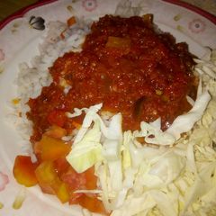 Carrot rice and stew with cabbage and tomatoes A picture of Carrot rice and stew with cabbage and tomatoes.