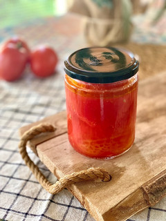 Una foto de Tomates en conserva