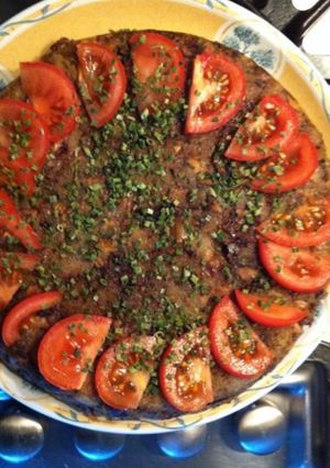 Une photo de Gâteau de poisson aux champignons et tomates