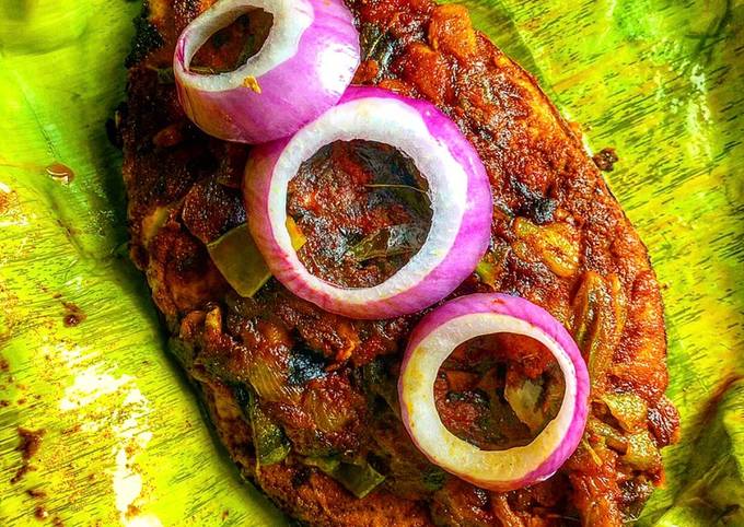 Meen Pollichathu- Kerala style fried fish steamed in banana leaf