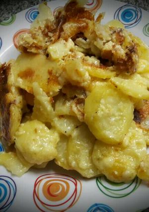 Una foto de Papas a la crema gratinadas