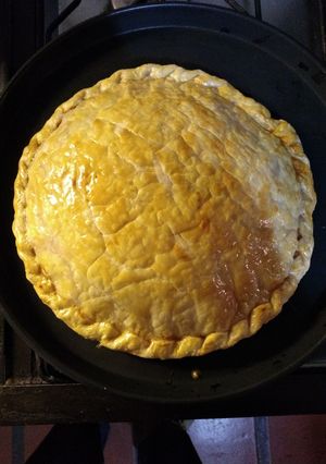 Una foto de Tarta de jamón, queso, champiñones y tomate