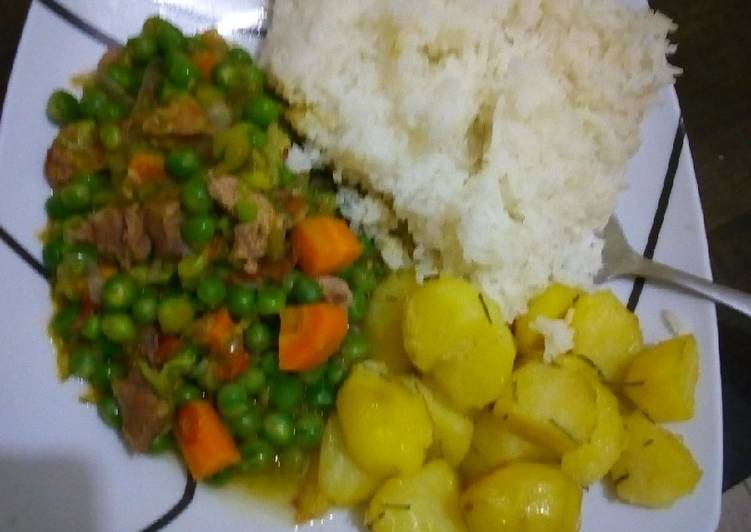 Beef n peas stew served with rice and Rosemary potatoes
