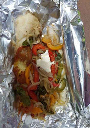 Una foto de Filete de pescado con morrón