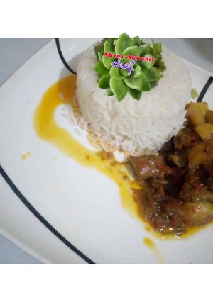 A picture of White rice and potato stew.