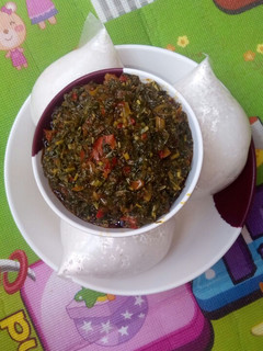 A picture of Rice swallow/vegetable soup.