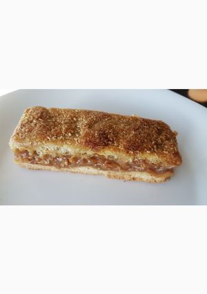 Una foto de Barrita de coco y dulce de leche