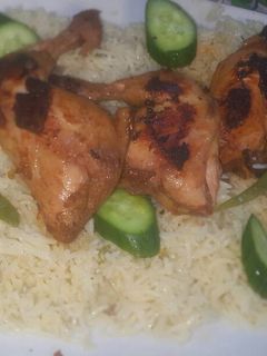 صورة لوصفة دجاج متبل مع رز الوليمه 😍