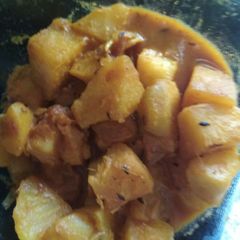 A picture of Aloo kopir dalna(cauliflower potato curry).