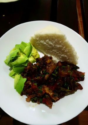 A picture of Ugali and beef stew.