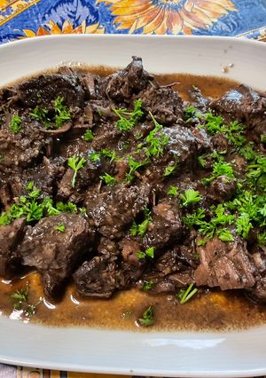 A picture of Peposo-Style Beef with Black Pepper and Red Wine.