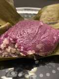 Purple yam in banana leaves (kue bugis)
