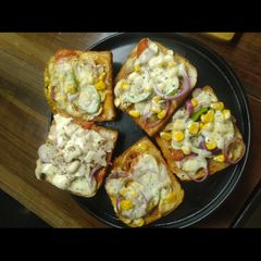 A picture of Bread Pizza on Tawa/ Instant Pizza.