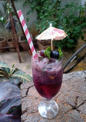 A picture of Grapes black grapes Mojito.