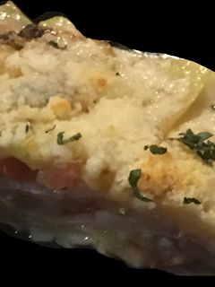 Una foto de Calabacines con parmesano gratinado
