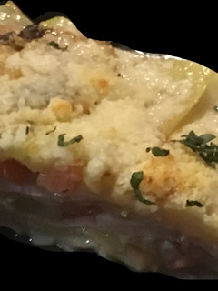 Una foto de Calabacines con parmesano gratinado