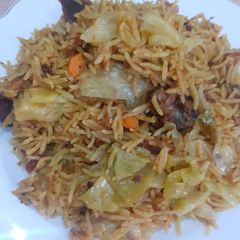 A picture of Garlic Jollof Rice.