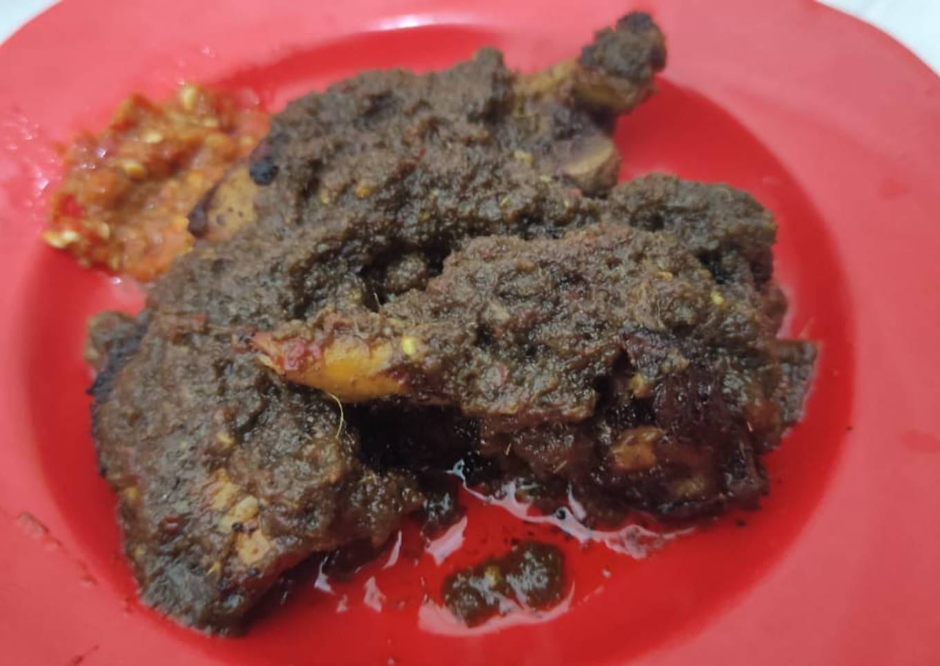 Ayam goreng bumbu hitam khas madura
