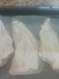 Una foto de Filetes de merluza con alioli
