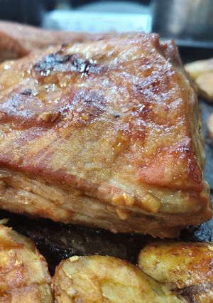 Una foto de Pechito de cerdo al Horno con papas