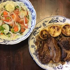 A picture of California Farm Lamb Chops with Breaded Squash and Summer Salad.
