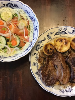 A picture of California Farm Lamb Chops with Breaded Squash and Summer Salad.