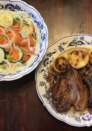 A picture of California Farm Lamb Chops with Breaded Squash and Summer Salad.
