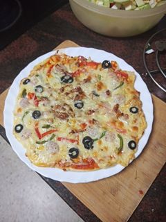 Una foto de Pizza de gambas, pimiento y bacon