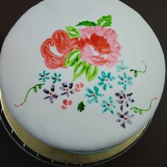 Eggless chocolate cake with white fondant A picture of Eggless chocolate cake with white fondant.